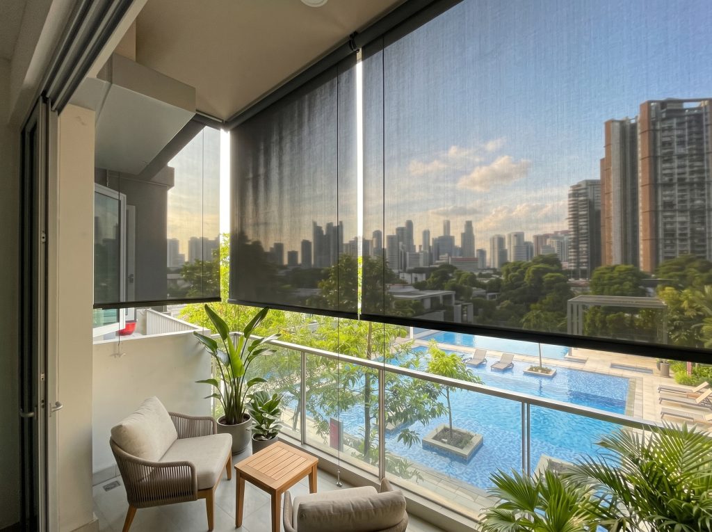 Black rain protection blinds for a Singapore condo balcony, offering maximum privacy.