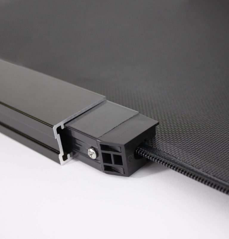 Secure side channel system for ZipTrack alternative heavy-duty outdoor shades.