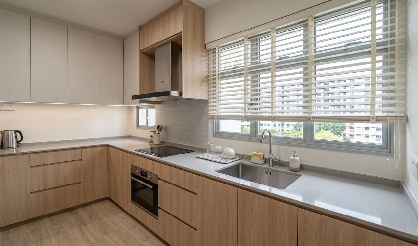 Polystyrene Venetian blinds beside the window of a Singapore HDB kitchen