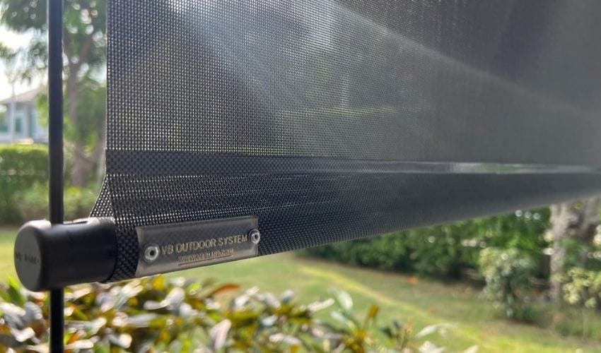 Cable-guided outdoor roller blinds installed on a sheltered Singapore balcony