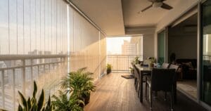 Outdoor blinds shading a modern Singapore condo balcony from afternoon sun